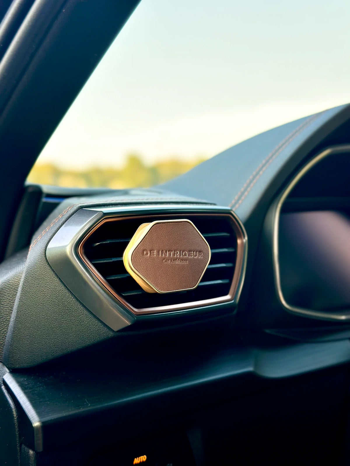 Intrigeur autoclip goud/bruin